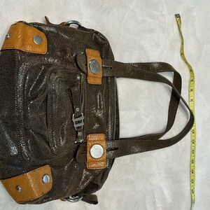 Brown and tan shiny B Makowsky purse